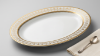 Picture of Oval Ceramic Serving Plate 30cm Length 20cm Width 3cm Height with Gold Decorative Rim Large Platter for Serving Main Dishes Salads Appetizers and Desserts Suitable for Home Dining and Special Occasions